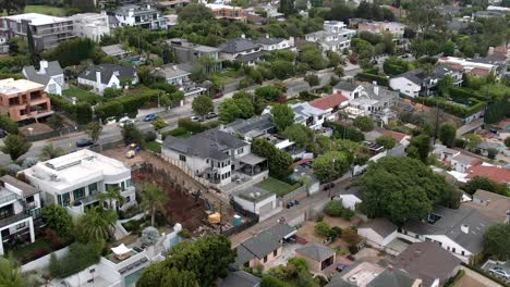 Aerial-view-flyover-Brentwood-diverse-upscale-residential-neighbourhood-houses-during-daytime
