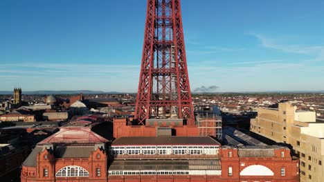 Aerial-drone-flight-of-Blackpool-tower-from-the-ground-and-then-rising-to-the-top-observation-eye