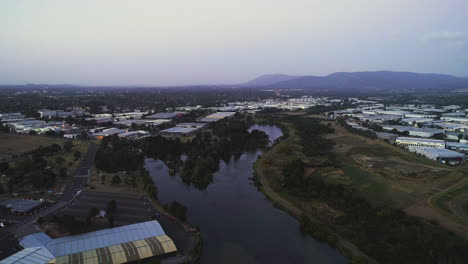 Aerial-perspective-of-Mount-Dandenong,-Victoria-as-seen-from-business-park-during-dusk-lighting
