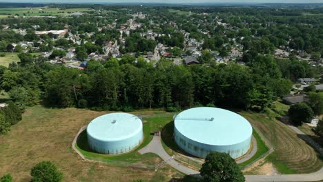 Municipal-water-source-storage-tanks-on-hill-above-American-town