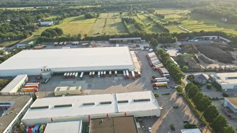 Aerial-of-trucks-parked-at-large-logistical-center