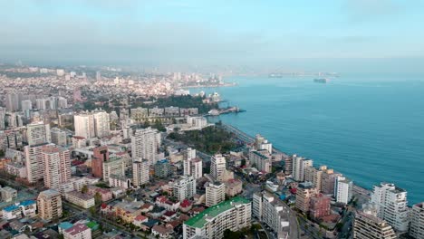 Aerial-orbit-of-the-residential-and-tourist-center-of-ViÃ±a-del-Mar,-cloudy-day