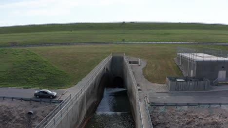 Wide-aerial-panning-shot-of-the-Wakarusa-River-spillway-at-the-Clinton-Lake-Dam-in-Kansas