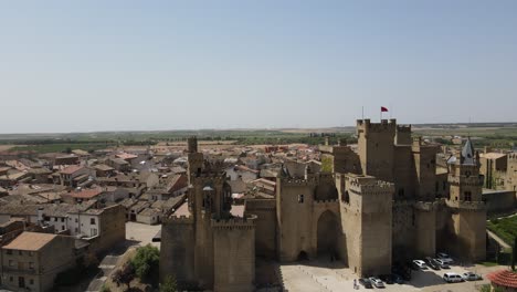 Olite-Navarra-Castle-and-tower-on-a-beautifully-warm-summery-day