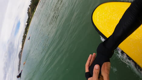 Vertical-Surfing-on-yellow-surfboard-and-falling-into-water