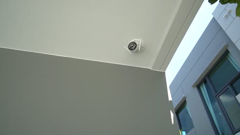 White-Outdoor-CCTV-Camera-On-Celling,-No-People