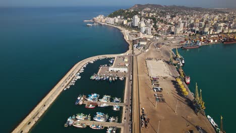 Port-with-fishing-boats-and-vessels-near-Durres-city-in-Albania,-Mediterranean-coastline