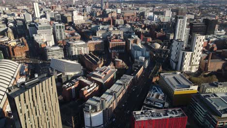 Aerial-drone-flight-over-the-rooftops-of-Manchester-city-centre-and-Oxford-Road-Train-Staion