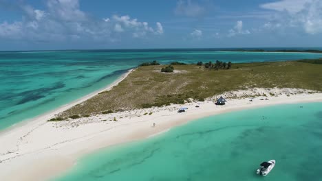 AERIAL-LANDSCAPE-TROPICAL-ISLAND,-cayo-de-agua-los-Roques,-TURN-AROUND-180-degrees