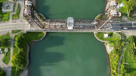 Top-view-over-historic-Welland-bridge-crossing-canal,-Ontario