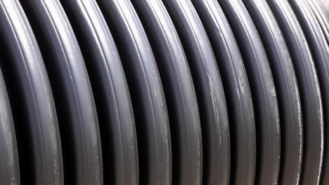 Pan-to-left-across-corrugated-pipes