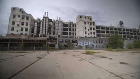 Low-angle-4k-drone-view-of-abandoned-manufacturing-plant-in-Detroit-1