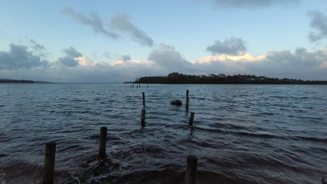 Waves-across-the-lake-on-a-winters-morning-in-Strahan,-West-Coast-Tasmania