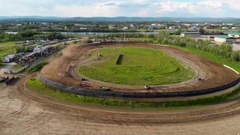 4K-Drone-Video-of-Modified-Stock-Car-Racing-at-Mitchell-Raceway-in-Fairbanks,-AK-during-Sunny-Summer-Evening-2