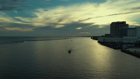 Aerial-view-of-approaching-fishing-boats-in-Biloxi,-Mississippi