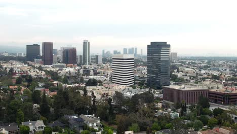 Aerial-view-of-Brentwood-California-cityscape-buildings-rising-above-high-rise-skyline