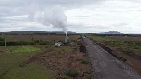 Geothermal-volcanic-electricity-power-station-in-countryside-of-Iceland,-aerial