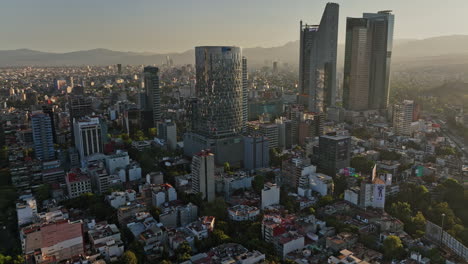 Mexico-City-Aerial-V19-Panorama-View-Drone-Flyover-Und-Rund-Um-Colonia-Cuauhtemoc-Und-Anres-Nachbarschaften,-Die-Den-Sonnenuntergang-Im-Stadtbild-Der-Innenstadt-Einfangen---Aufgenommen-Mit-Mavic-3-Cine---Dezember-2021