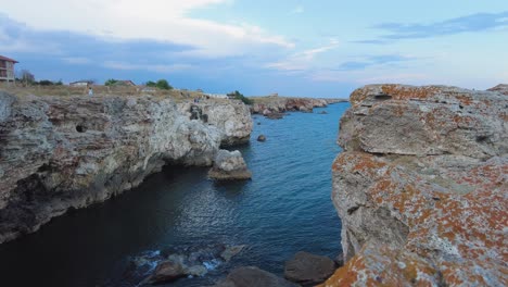 Tilt-up-steep-sea-cliffs-to-deep-blue-water-of-Black-Sea-in-Bulgaria