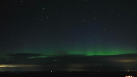 Clouds-covering-the-Northern-lights,-autumn-night-in-Lapland---aerial-hyperlapse