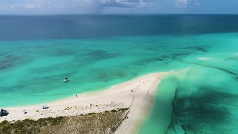 Drone-Turn-Around-Pristine-Tropical-Island,-Cascada-Los-Rocks,-Parque-Nacional