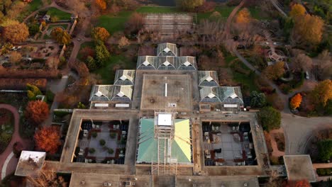 Glencoe,-Illinois,-USA:-Aerial-drone-bird's-eye-view-over-resort-inside-Chicago-Botanic-Garden-during-autumn-season-during-evening-time