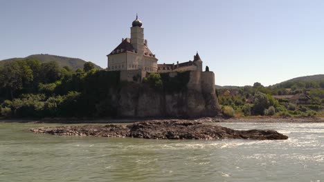 Castle-high-up-on-hill-as-seen-from-Wachau-Danube-cruise