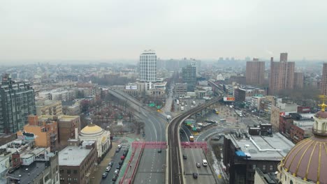 Slow-motion-drone-flyover-shot-of-Brooklyn-skyline-from-Williamsburg-Bridge