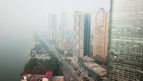 Drone-Shots-of-Changsha-during-a-foggy,-hazy-morning,-China
