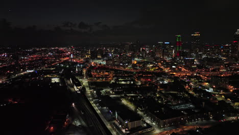 Atlanta-Aerial-v795-drone-flyover-cabbagetown-and-o4w-neighborhoods-capturing-shimmering-night-view-of-populous-downtown-cityscape---Shot-with-Mavic-3-Cine---December-2021