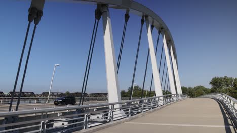 Main-Street-Bridge-in-Columbus,-Ohio-with-gimbal-video-close-up-walking-at-an-angle