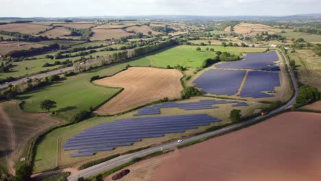 Static-Aerial-Shot-of-Large-Solar-Farm,-Renewable-Energy-in-Devon-Countryside