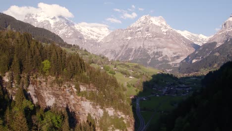 Aerial-drone-footage-pushing-out-with-spectacular-mountain-views-close-to-Grindelwald-in-the-Swiss-Alps