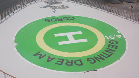 Helipad-on-ship-green-sign-to-hand-on-the-nose-of-cruise