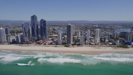 Broadbeach-Skyline-On-The-Gold-Coast,-Queensland,-Australia---aerial-pullback