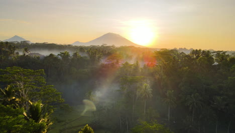 Fiery-Sunset-In-The-Scenic-Countryside-Of-Bali,-Indonesia---aerial-drone-shot