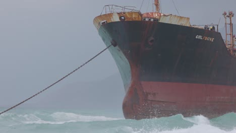 The-huge-waves-of-the-stormy-Indian-Ocean-crash-against-the-keel-of-a-wreck-on-the-shallows-of-Socotra-Island