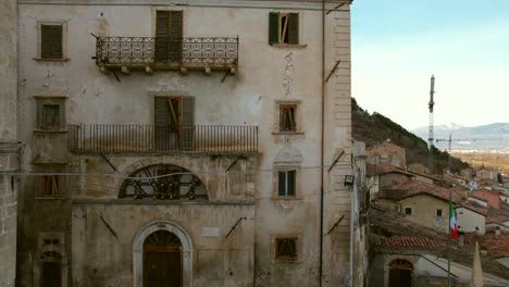 Aerial-video-of-the-abandoned-ghost-town-Fossa,-in-Italy