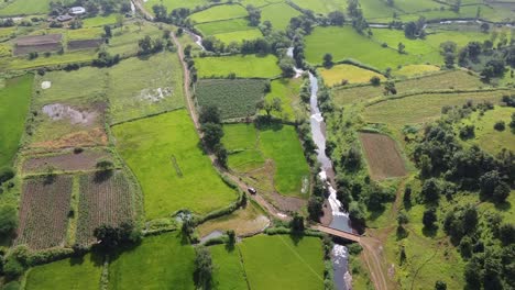 Aerial-View-Of-Agricultural-Fields-In-Trimbakeshwar,-Nashik,-India