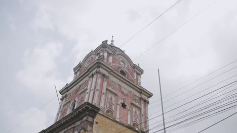 Footage-focusing-on-the-top-of-a-municipal-building-in-Solola,-Guatemala