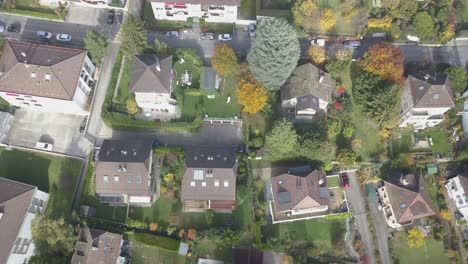 Lausanne-town-viewed-from-the-top,-Houses,-buildings,-garden-and-trees,-Urban-environment-with-nature-drone-aerial-view