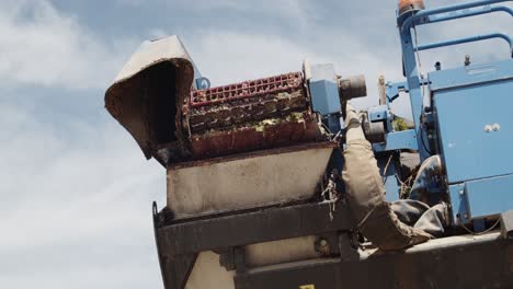 Detail-shot-of-a-Destemming-part-of-a-Grape-Harvester-in-Spain-being-Tested-in-Slow-Motion-60fps