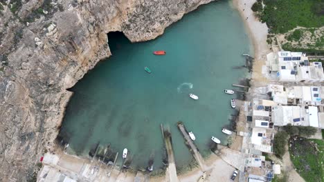 Dwejra-seawater-lagoon-linked-to-the-Mediterranean-sea-in-Gozo-island,-Malta