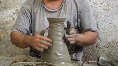 4K-Footage-of-ceramic-manufacture-mam-making-handcrafted-potteryn-in-a-factory