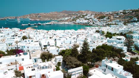 Drone-aerial-shot-above-Old-Town-in-Mykonos,-Greece-during-a-sunny-day