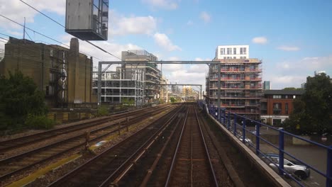 London-England-September-2022-Timelapse-of-DLR-trainline-from-rear-view-of-train