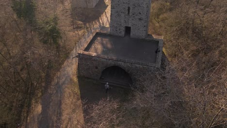 Panning-Shot-Of-A-Man-Exploring-The-Wetzlar-Tower-In-Stoppelberg