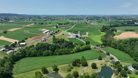 An-aerial-flight-over-the-rural-farmland-of-southern-Lancaster-County,-Pennsylvania-1