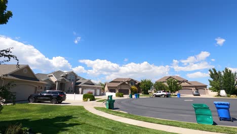 Typical-suburban-neighborhood-in-Utah-on-a-sunny-day---panning-time-lapse