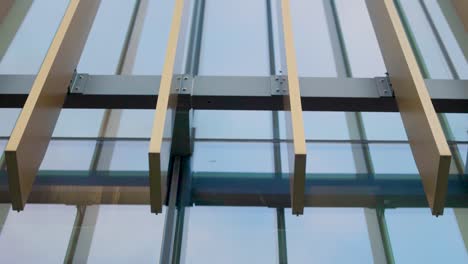 Modern-architectural-window-frame-close-up-details-of-steel-and-aluminum-glass-curtain-wall-construction